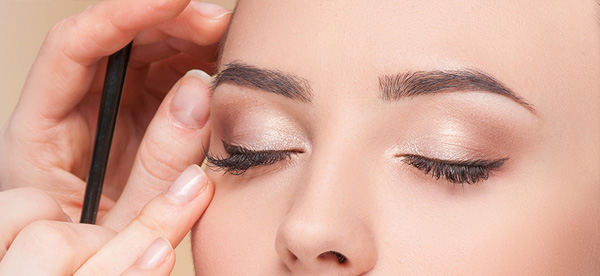 oman with Expert Eyebrow Mapping in Spokane, Cheney, and Coeur d'Alene - Embracing Confidence with Perfectly Mapped Brows.